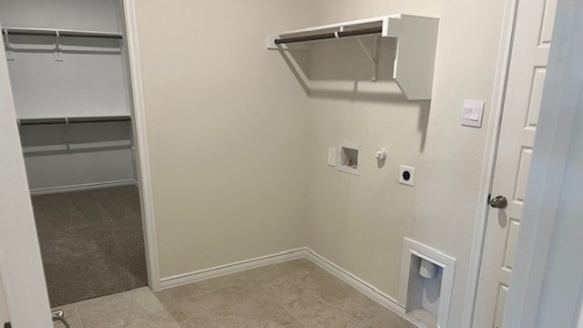 clothes washing area with gas dryer hookup, hookup for a washing machine, electric dryer hookup, and light tile patterned floors