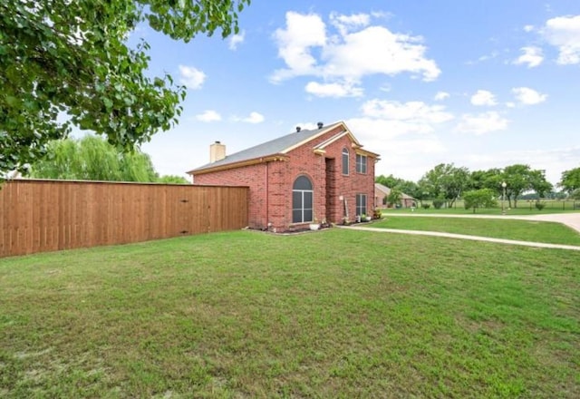 exterior space featuring a yard