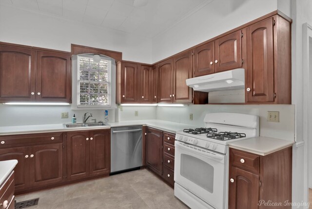 kitchen featuring stainless steel dishwasher, white gas stove, and sink