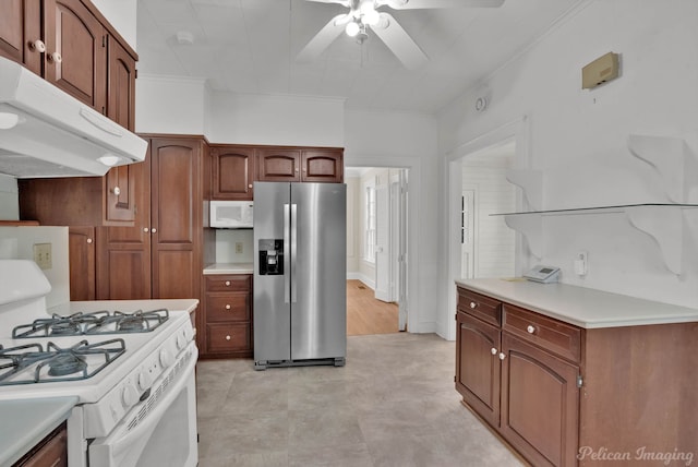 kitchen featuring ceiling fan, white appliances, and ornamental molding