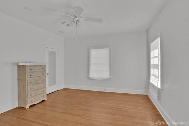 unfurnished bedroom with ceiling fan and light wood-type flooring