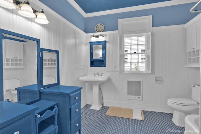 bathroom with tile patterned floors, toilet, and ornamental molding