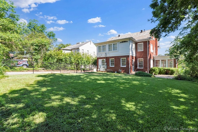 view of front facade with a front yard