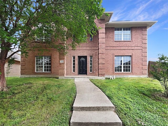 view of front of home with a front yard