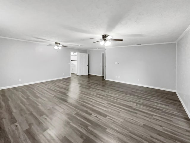 interior space featuring a textured ceiling, dark hardwood / wood-style floors, and crown molding