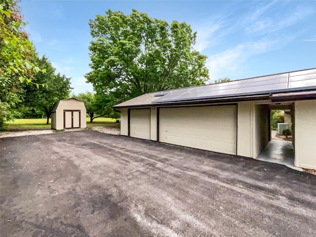 garage featuring solar panels