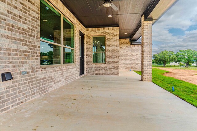 view of patio / terrace featuring ceiling fan