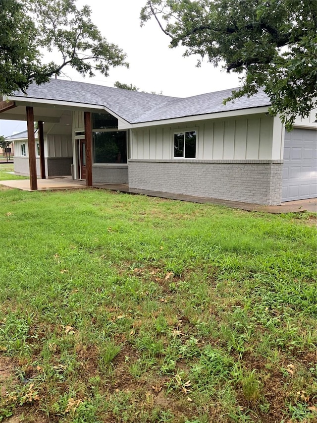 exterior space with a yard