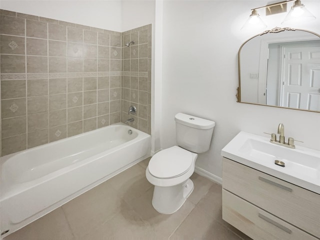 full bathroom with tile patterned floors, vanity, toilet, and tiled shower / bath