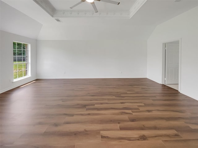 empty room with hardwood / wood-style flooring, vaulted ceiling, and ceiling fan