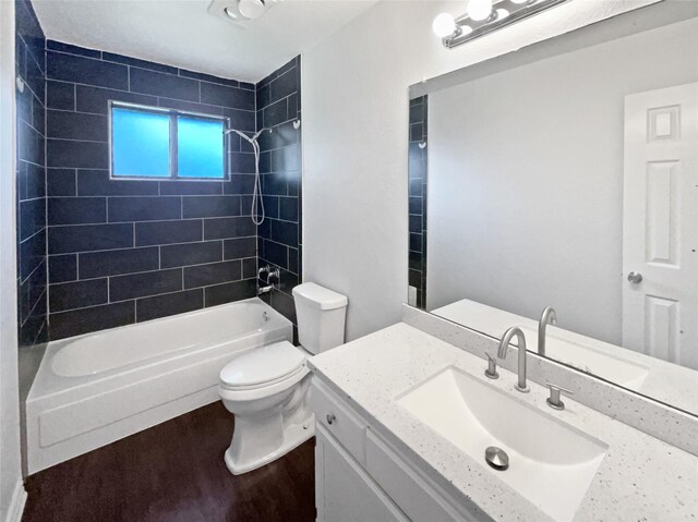 empty room featuring a ceiling fan, baseboards, and dark flooring