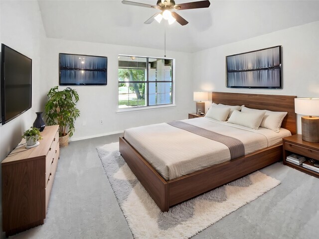 empty room with ceiling fan, baseboards, and dark wood finished floors