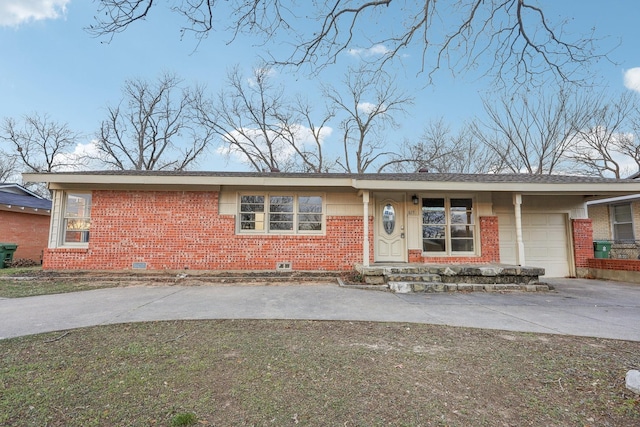 ranch-style house with a garage