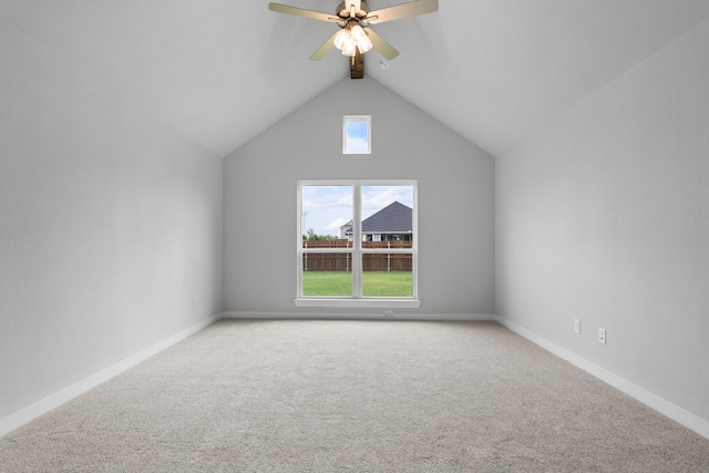 additional living space with ceiling fan, carpet floors, and vaulted ceiling