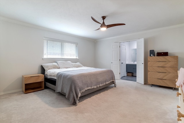 bedroom featuring ensuite bathroom, ceiling fan, and light colored carpet