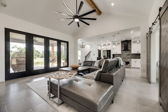 tiled living room featuring french doors, beamed ceiling, a barn door, high vaulted ceiling, and ceiling fan