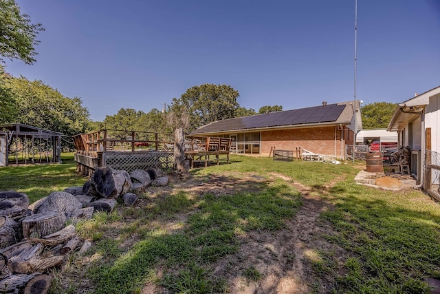 view of yard featuring a deck