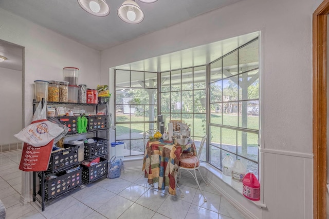 dining area with light tile patterned floors