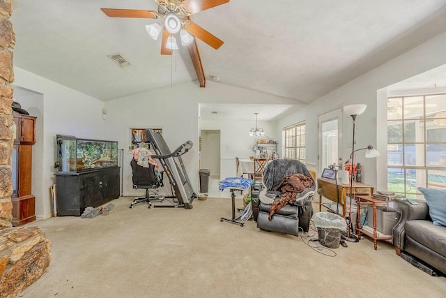 interior space featuring vaulted ceiling with beams, light colored carpet, and a wealth of natural light