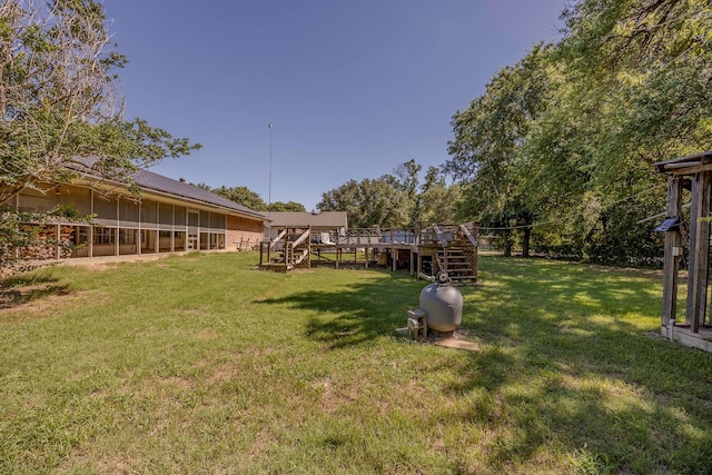 view of yard with a deck