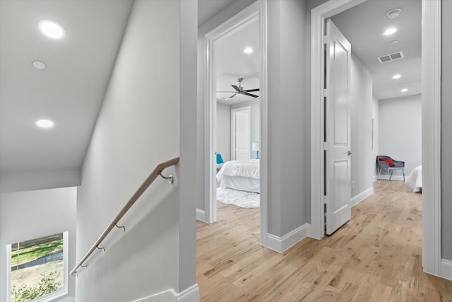 corridor featuring light hardwood / wood-style flooring