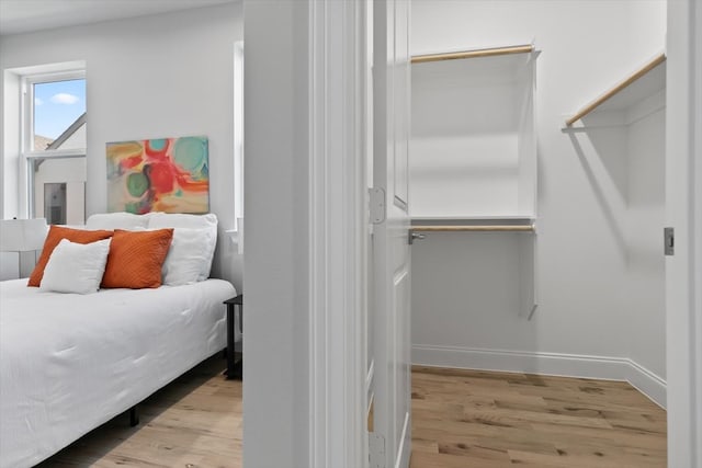 bedroom with light wood-type flooring