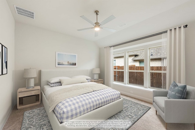 bedroom featuring light colored carpet, ceiling fan, and vaulted ceiling