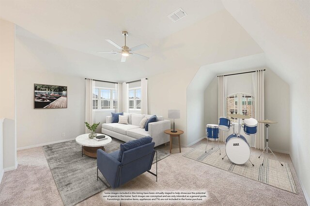 living room featuring vaulted ceiling, light colored carpet, and ceiling fan