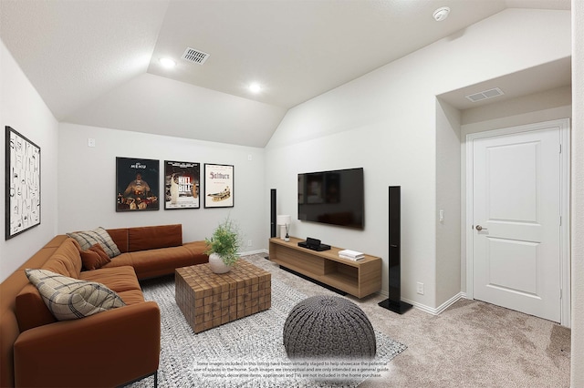 carpeted living room with vaulted ceiling