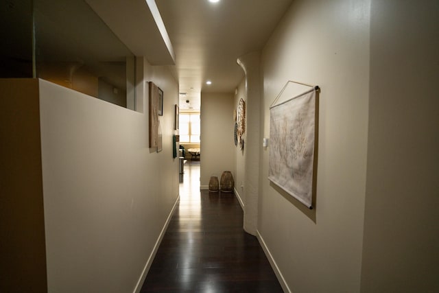 hall featuring dark wood-type flooring