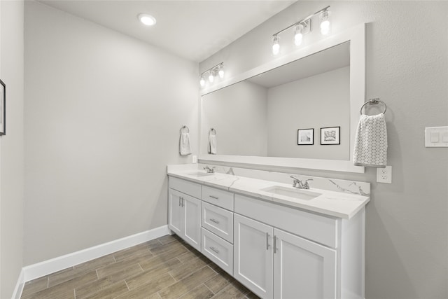 bathroom featuring double vanity