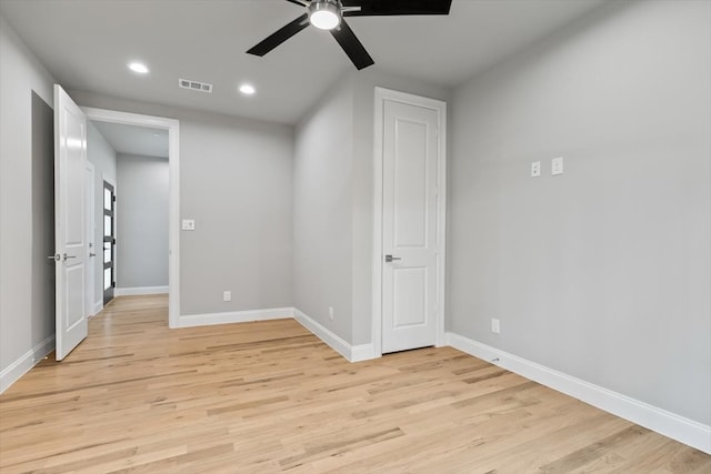 unfurnished bedroom featuring light hardwood / wood-style floors and ceiling fan