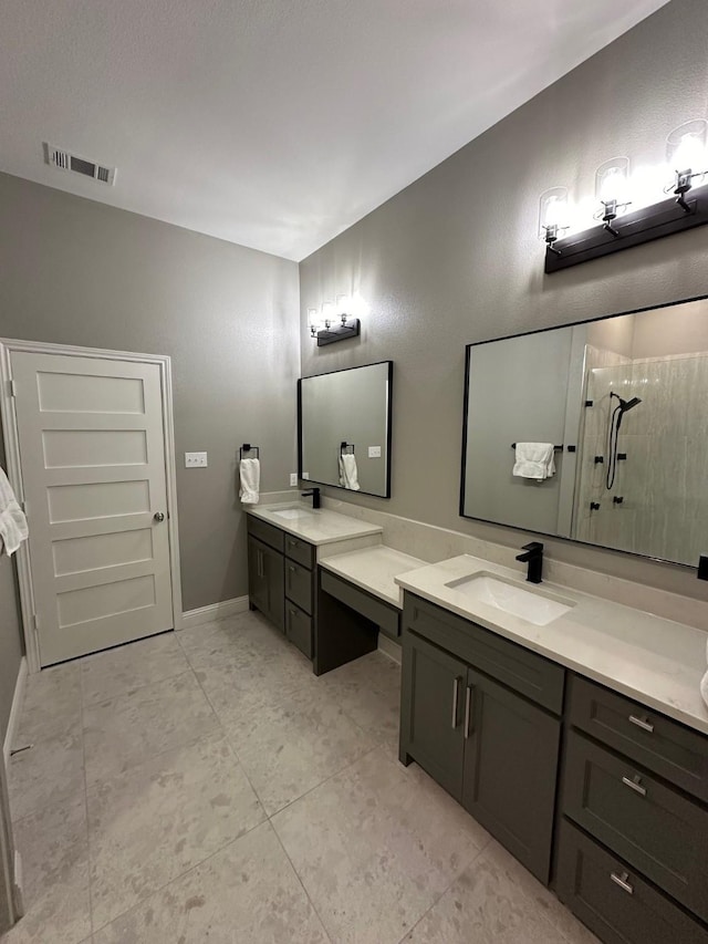 bathroom with walk in shower and vanity