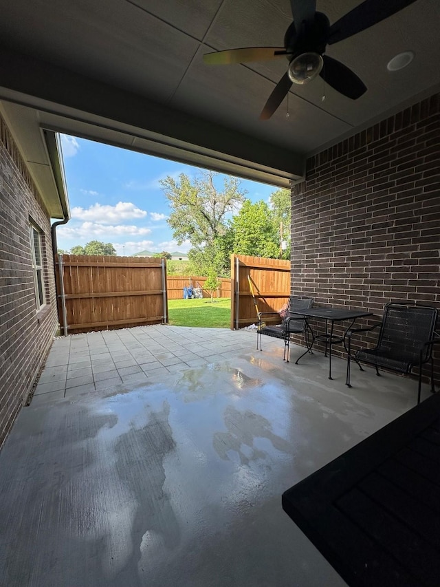 view of patio with ceiling fan