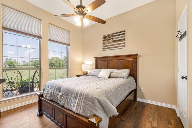 bedroom featuring ceiling fan and wood-type flooring