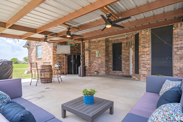 view of patio featuring an outdoor living space and ceiling fan