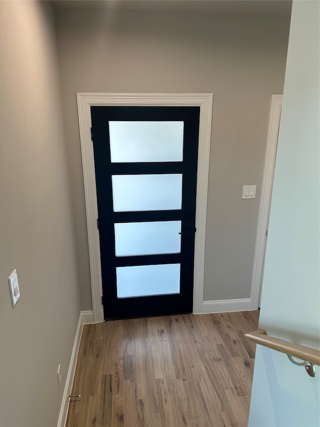 foyer with light hardwood / wood-style floors