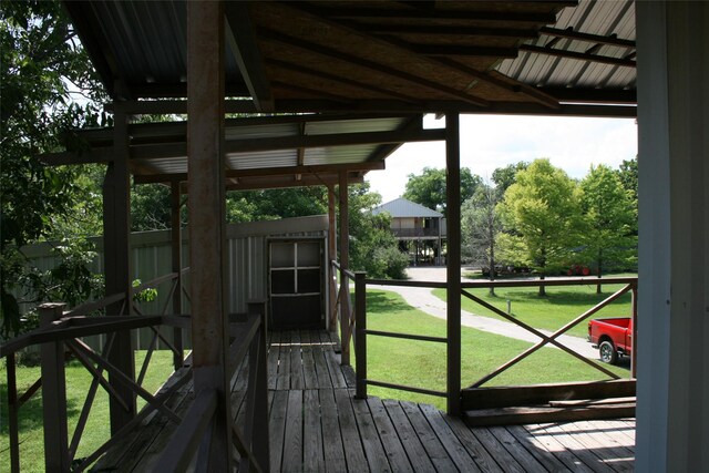 deck featuring a lawn