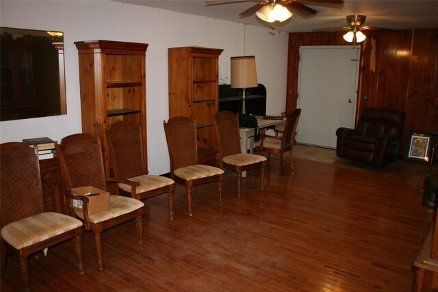 interior space featuring wood-type flooring and ceiling fan