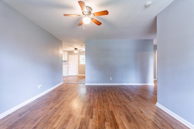 spare room with wood-type flooring