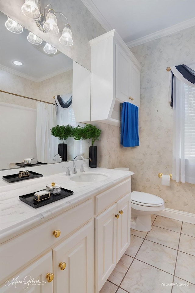 bathroom with tile patterned floors, vanity, crown molding, and toilet