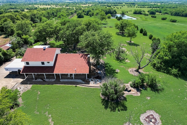 birds eye view of property with a rural view