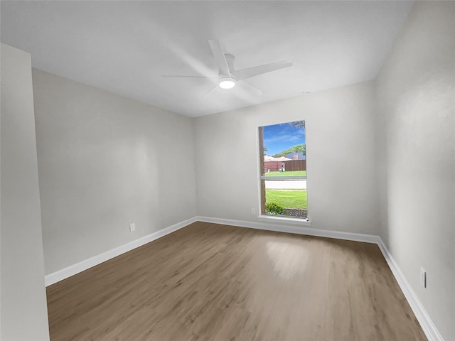 empty room featuring ceiling fan and wood-type flooring