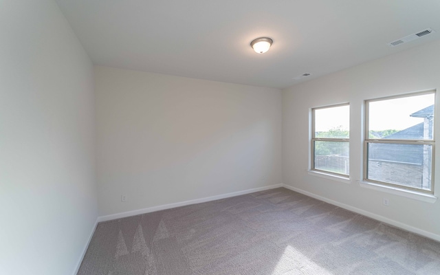 empty room featuring carpet