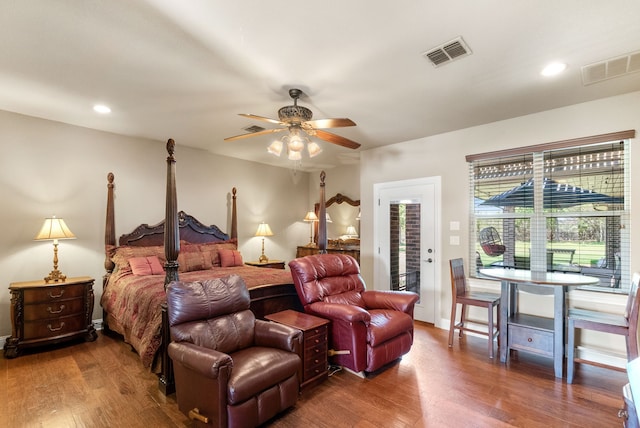 bedroom featuring access to outside, ceiling fan, and wood-type flooring