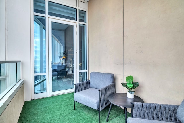 living area featuring carpet floors