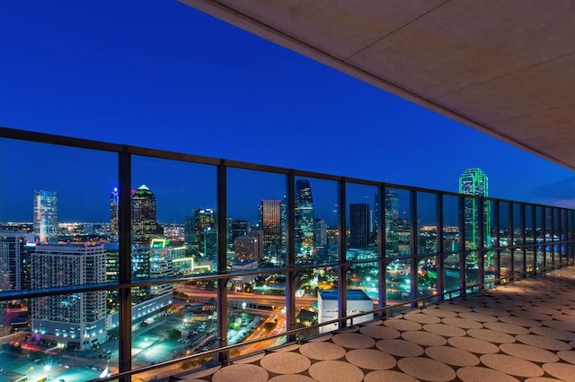 view of balcony at twilight