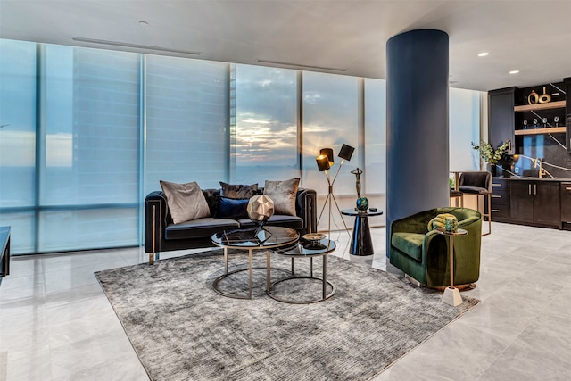 tiled living room with expansive windows