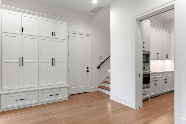 mudroom featuring light hardwood / wood-style flooring