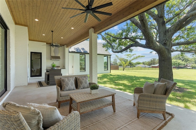 view of patio / terrace featuring an outdoor living space and ceiling fan